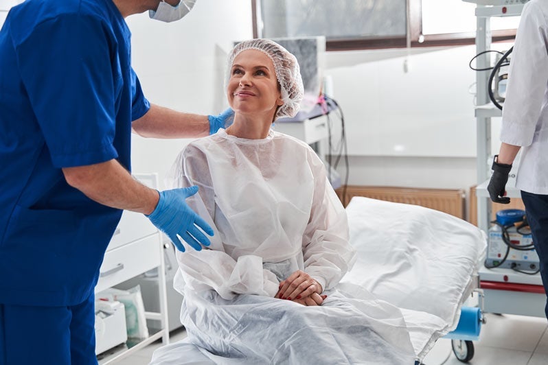 Man calming his patient before surgery